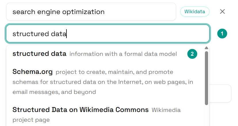 A new topic box with structured data typed in (1) and the matching entry in the list below (2)